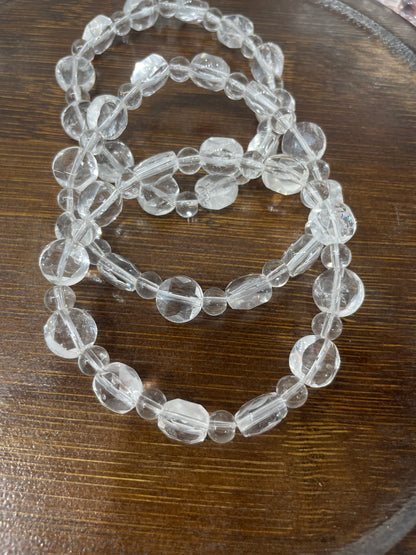 Clear quartz coin faced bracelet