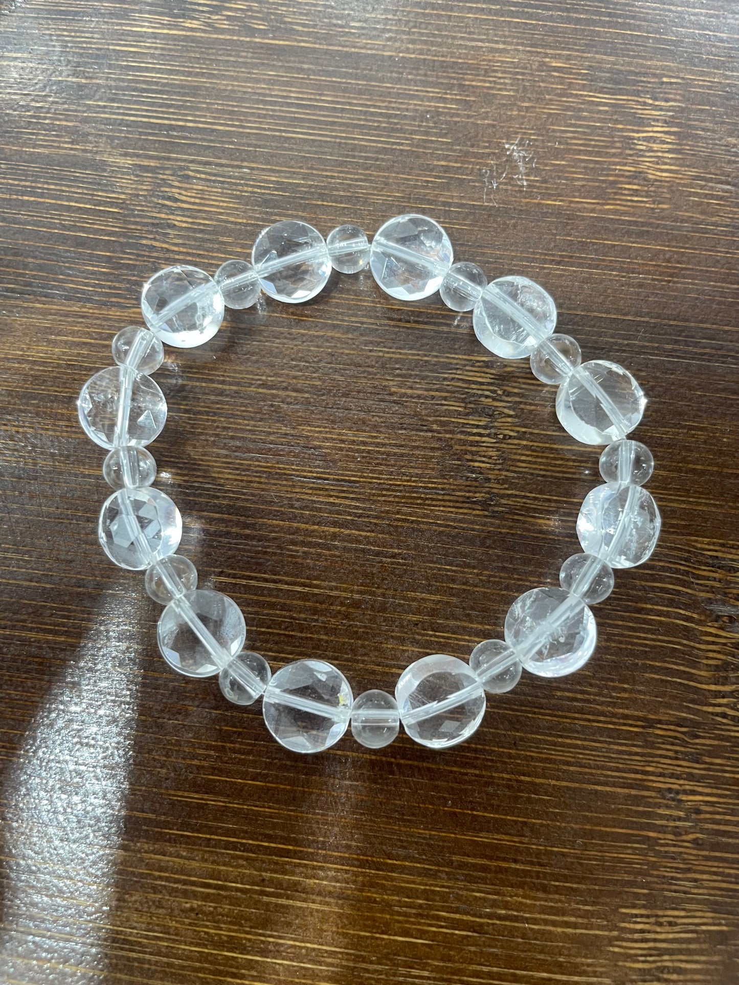 Clear quartz coin faced bracelet